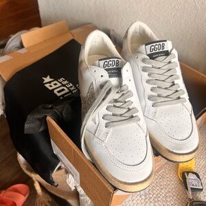 Golden goose, never worn, in box